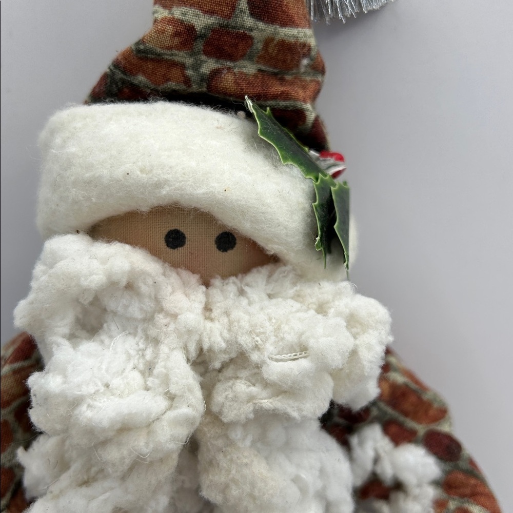 Festive Santa Claus Plush with Wreath and Stocking - Picture 2 of 9